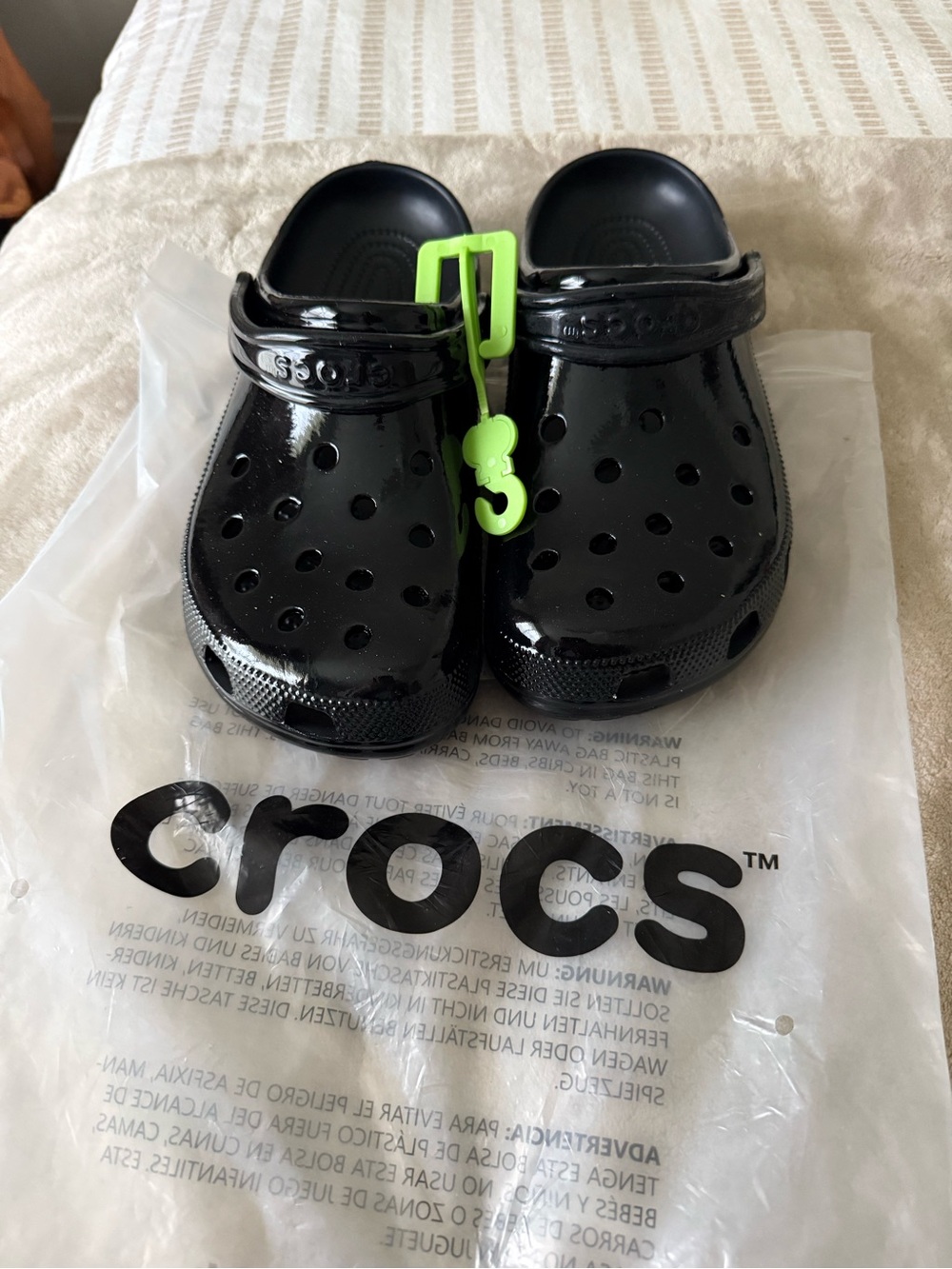 CROCS Kids Black Classic Clog with Neon Green Tag